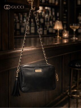 AUTHENTIC GUCCI SASSY CROSSBODY CAMERA BAG-BLACK LEATHER CREST CHARM TASSEL